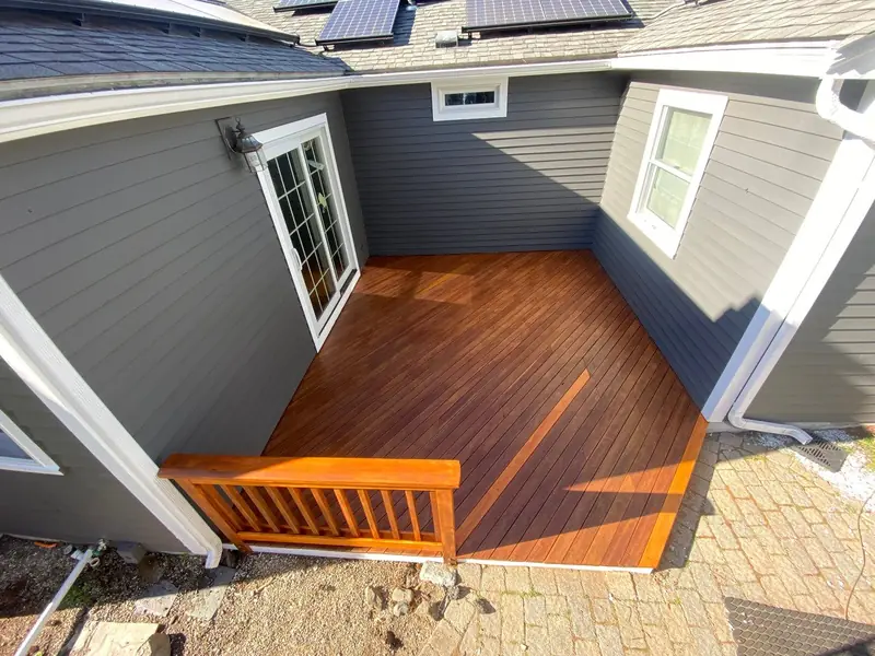 New deck with freshly stained boards and railings