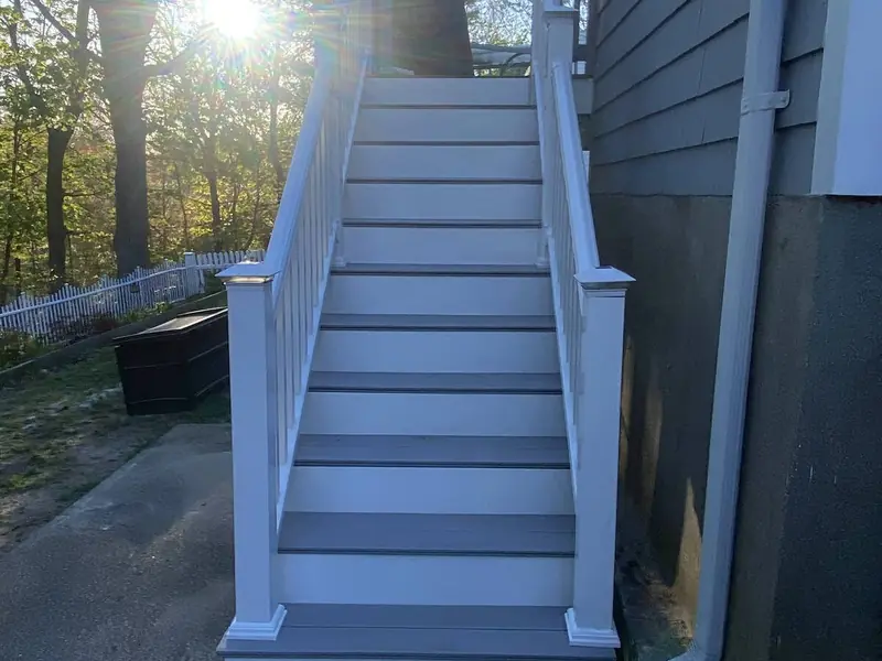 New exterior stairs with white railings